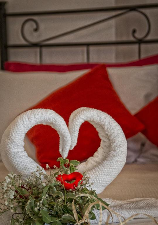 Postel nebo postele na pokoji v ubytování Le Sette Perle