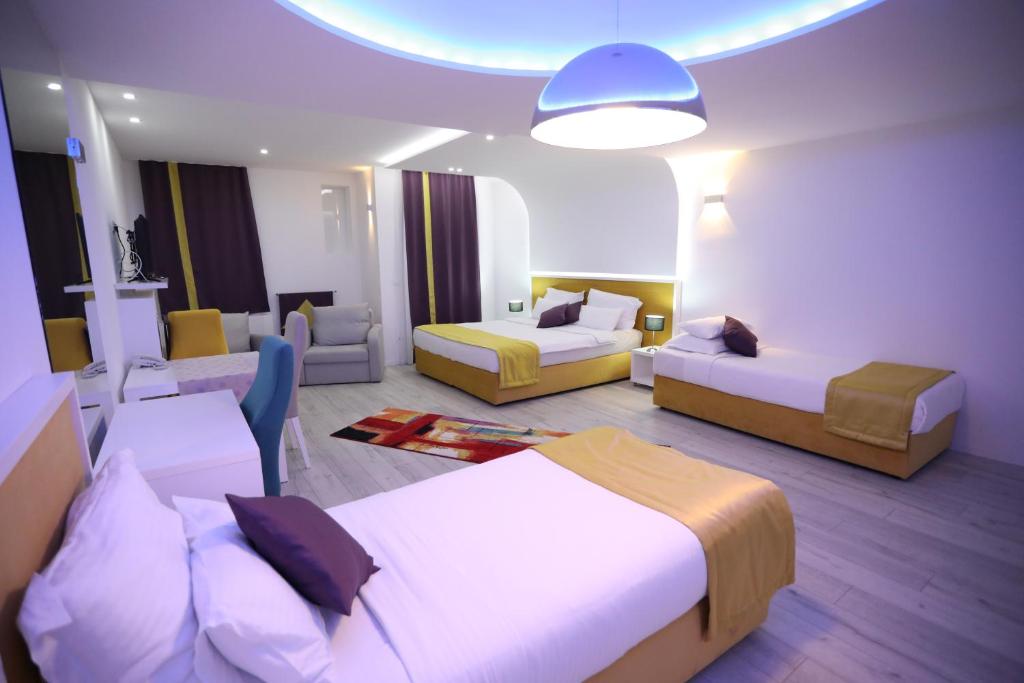 Postel nebo postele na pokoji v ubytování Hotel Boutique Libris