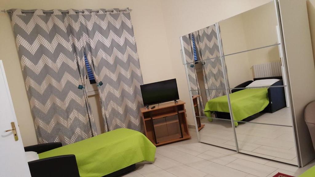 Postel nebo postele na pokoji v ubytování Angeli