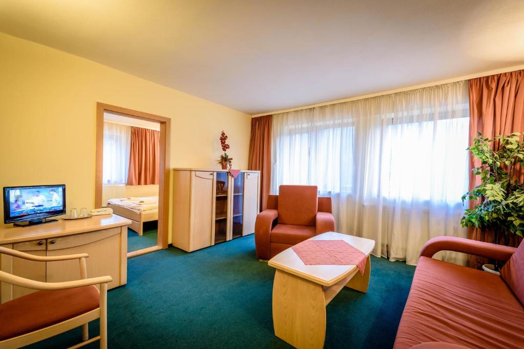 TV a/nebo společenská místnost v ubytování Hotel Boboty