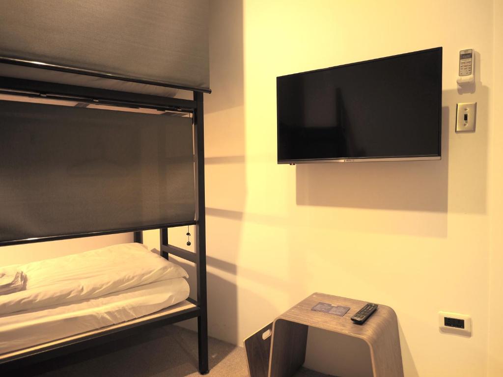 Postel nebo postele na pokoji v ubytování Daan Park Hotel
