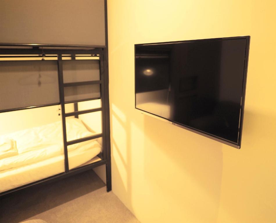 Postel nebo postele na pokoji v ubytování Daan Park Hotel