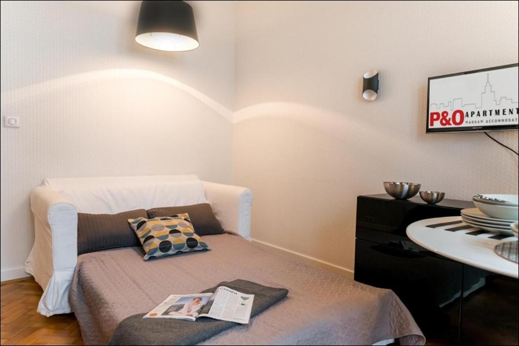 Posteľ alebo postele v izbe v ubytovaní P&O Apartments Poznańska