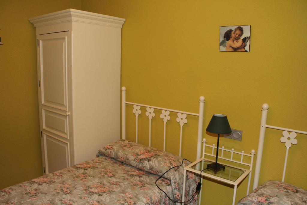 Posteľ alebo postele v izbe v ubytovaní Apartamentos Costa Noja