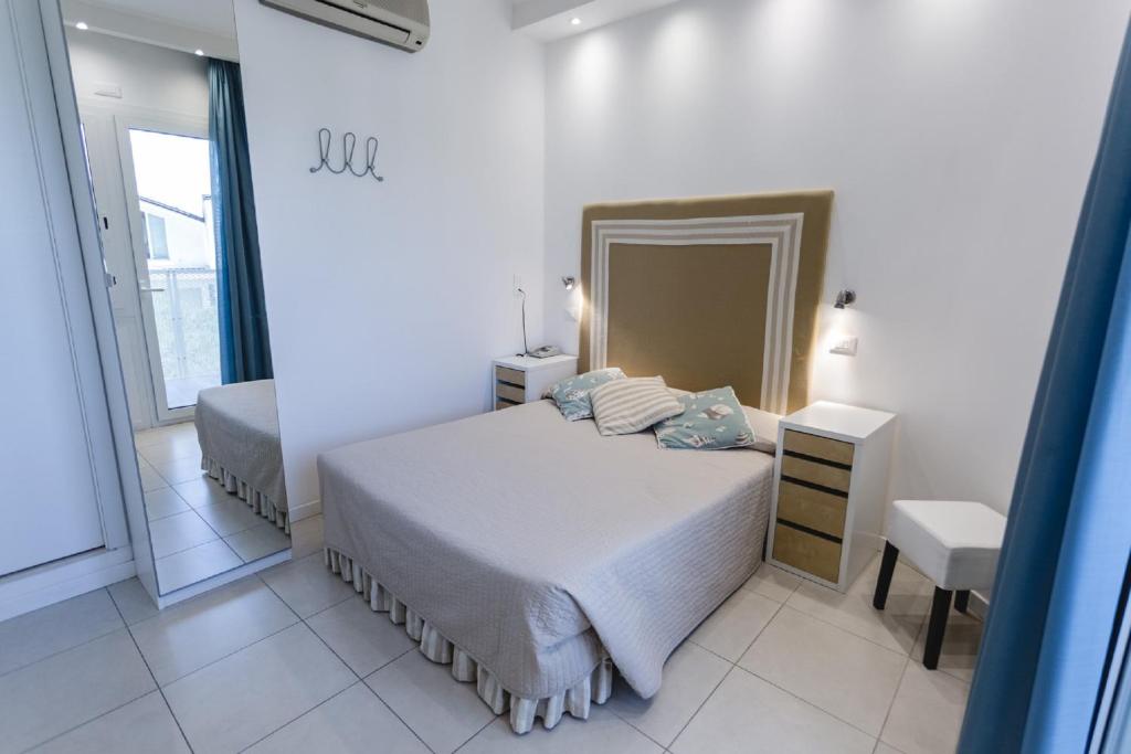 Postel nebo postele na pokoji v ubytování Hotel Speranza