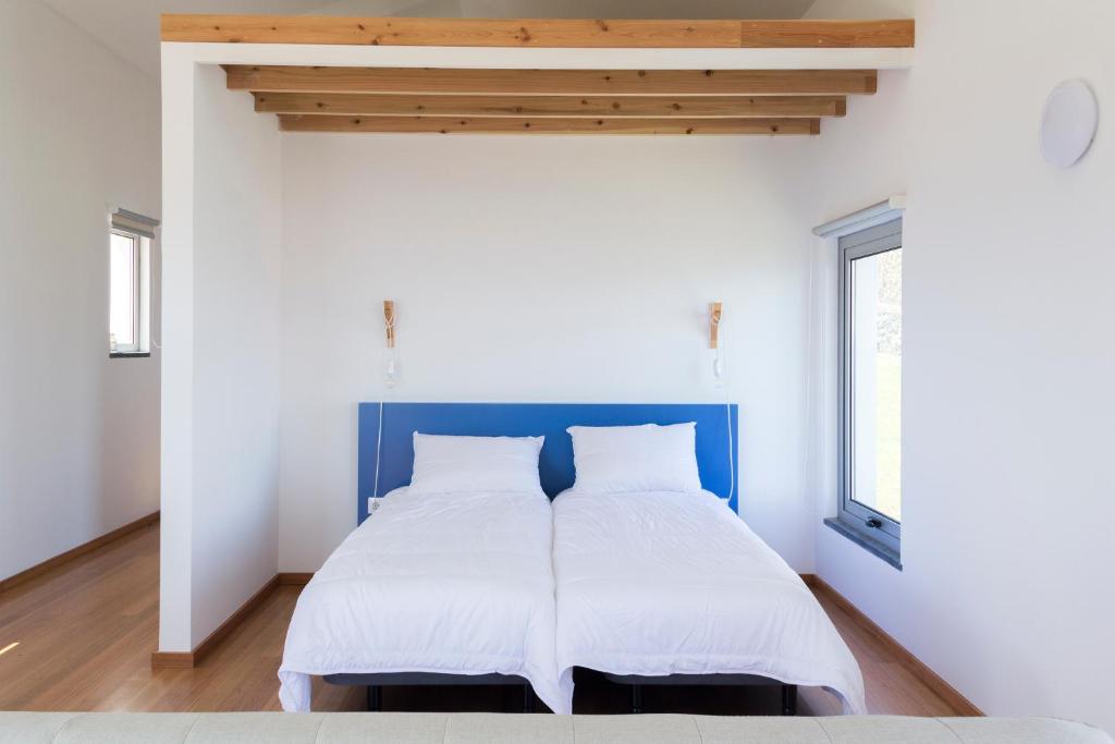 Postel nebo postele na pokoji v ubytování Lofts Azul Pastel