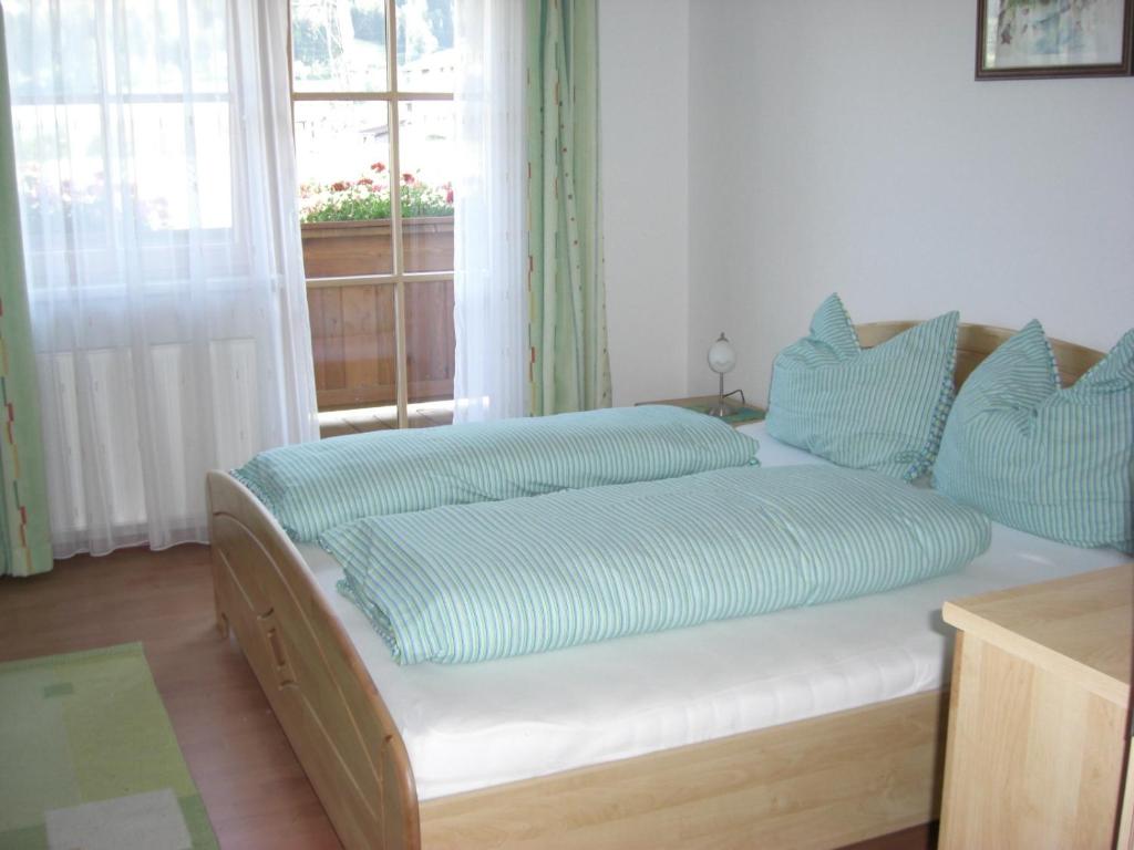 Posteľ alebo postele v izbe v ubytovaní Ferienwohnung Prader