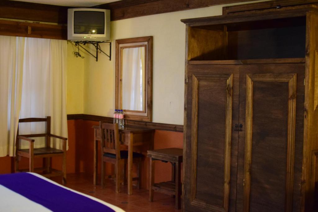 Postel nebo postele na pokoji v ubytování Hotel Tradicional