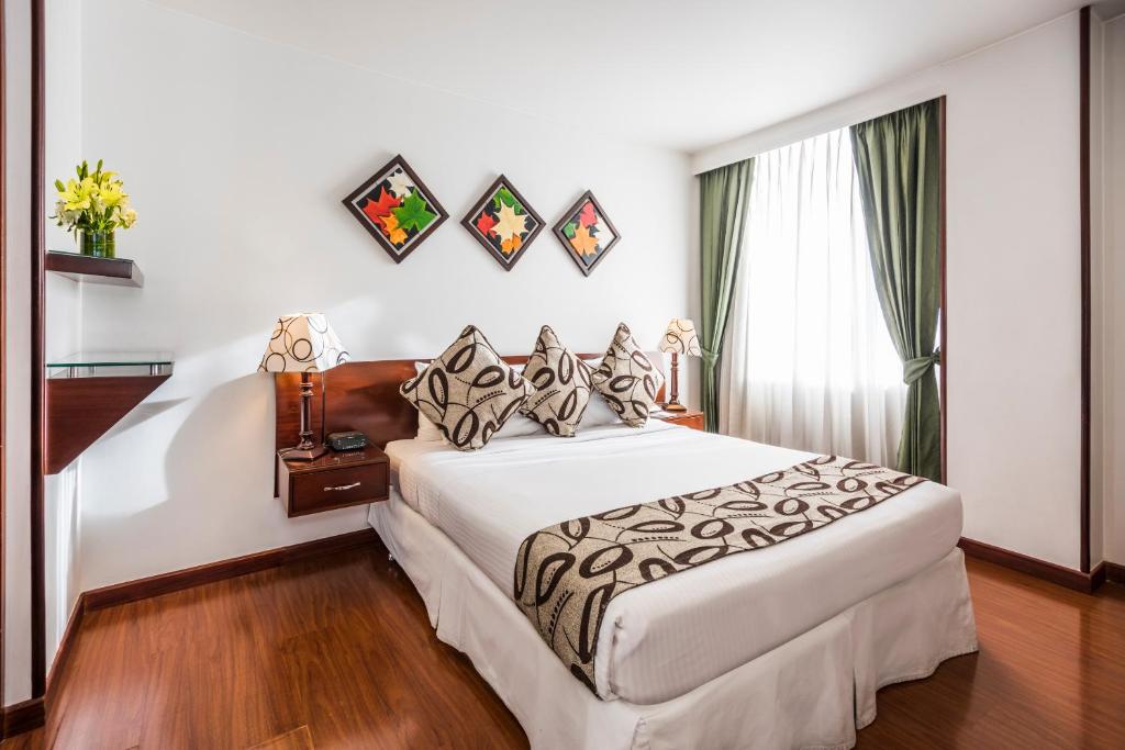 Postel nebo postele na pokoji v ubytování Hotel Platinum Suite