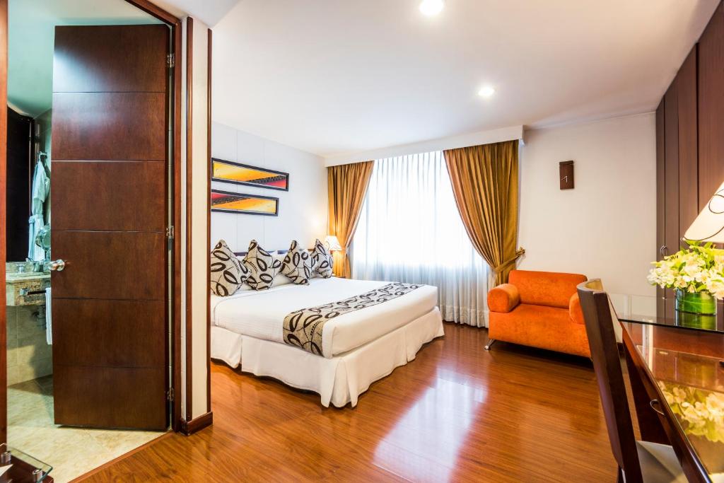 Postel nebo postele na pokoji v ubytování Hotel Platinum Suite