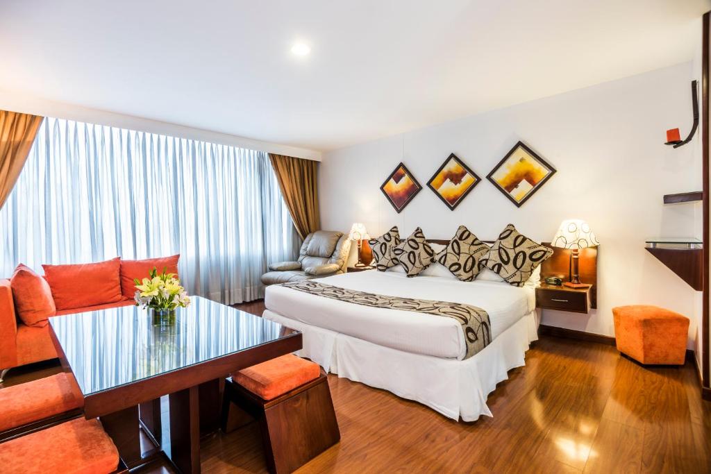 Postel nebo postele na pokoji v ubytování Hotel Platinum Suite