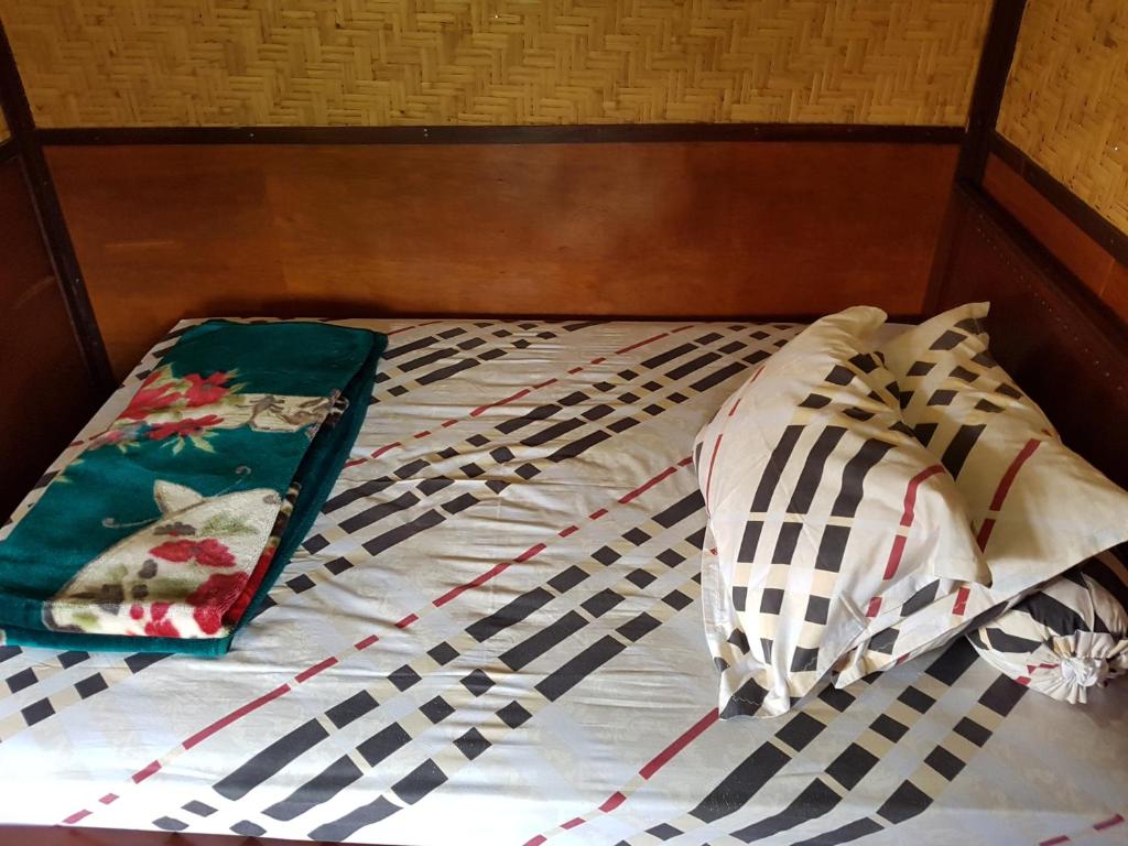 Postel nebo postele na pokoji v ubytování Radiya Guesthouse