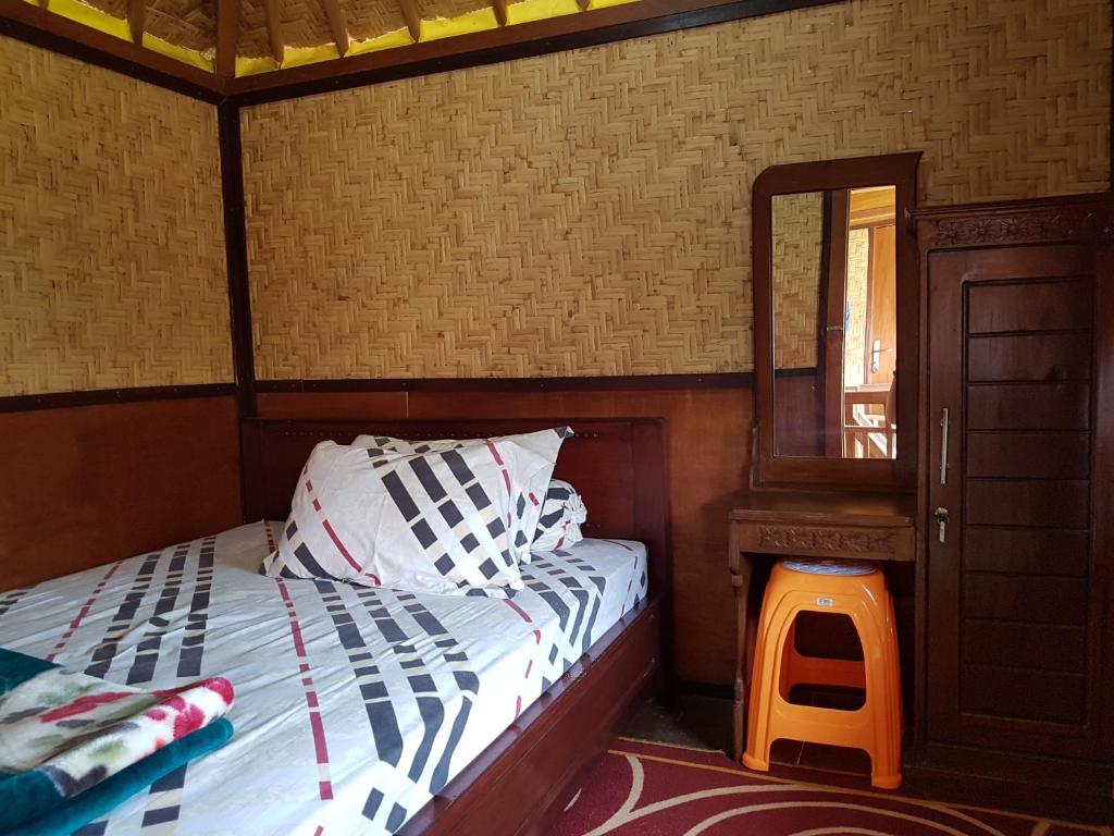 Postel nebo postele na pokoji v ubytování Radiya Guesthouse