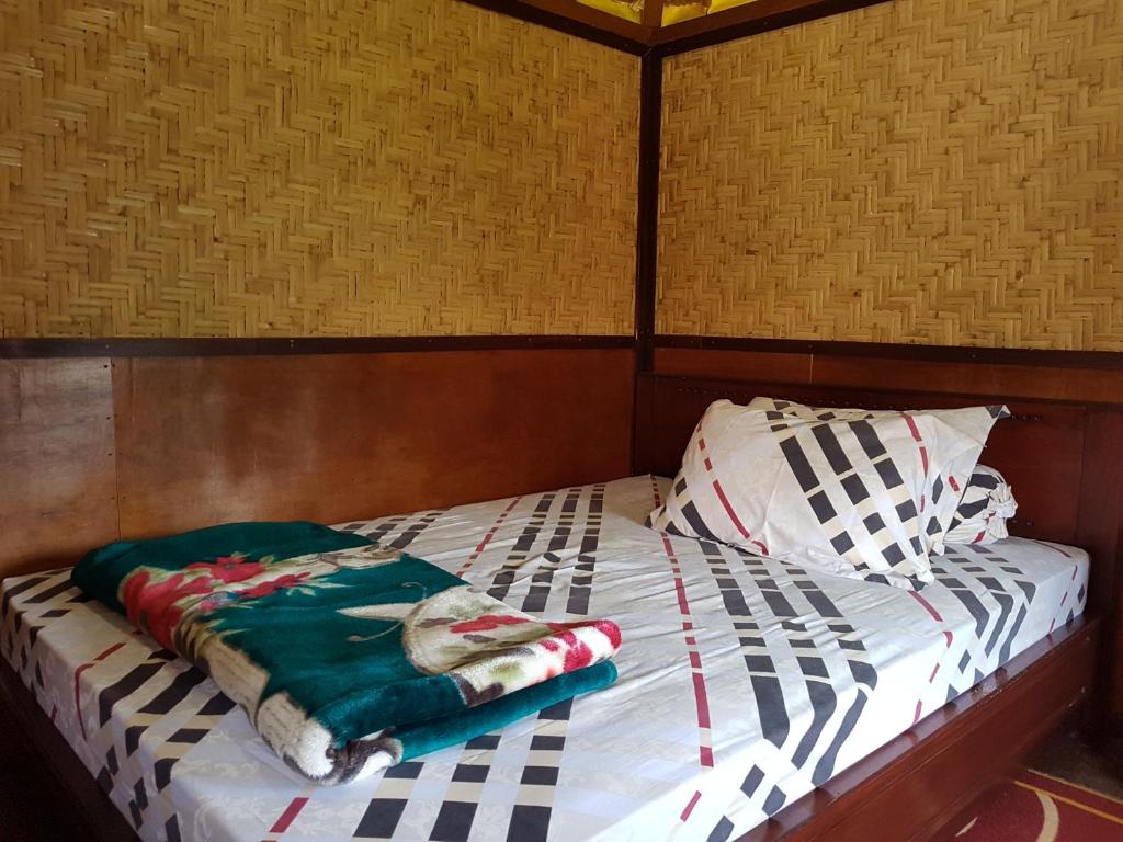 Postel nebo postele na pokoji v ubytování Radiya Guesthouse