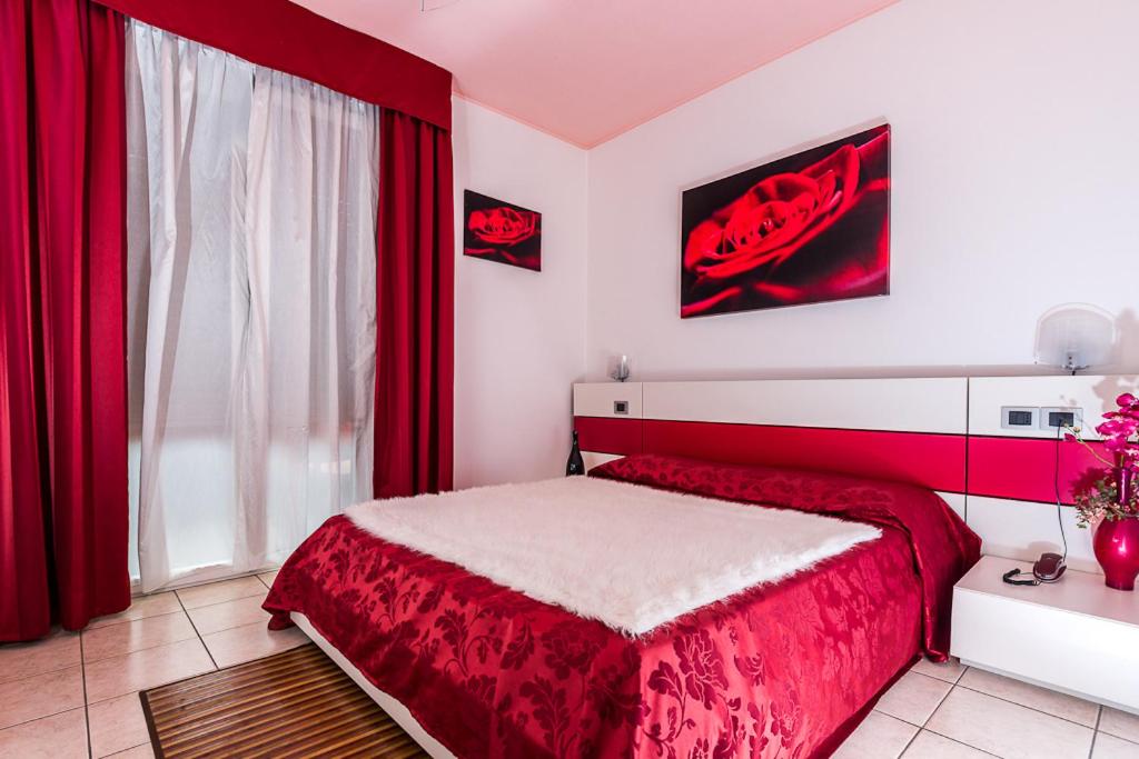 Postel nebo postele na pokoji v ubytování Hotel Alle Due Palme