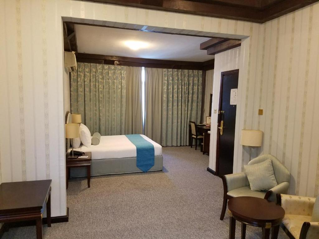 Postel nebo postele na pokoji v ubytování Verona Resorts Sharjah