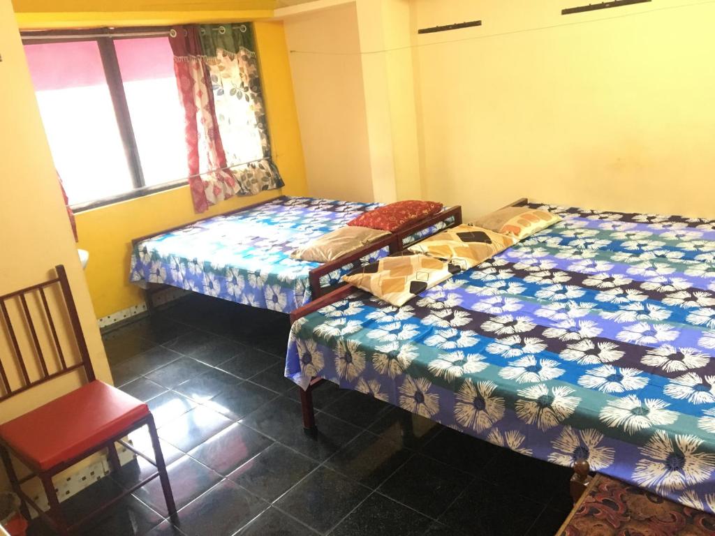 Postel nebo postele na pokoji v ubytování Pleasant Inn