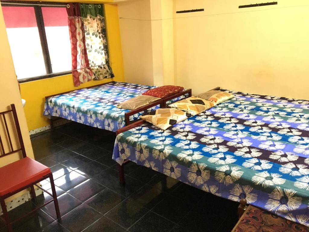 Postel nebo postele na pokoji v ubytování Pleasant Inn