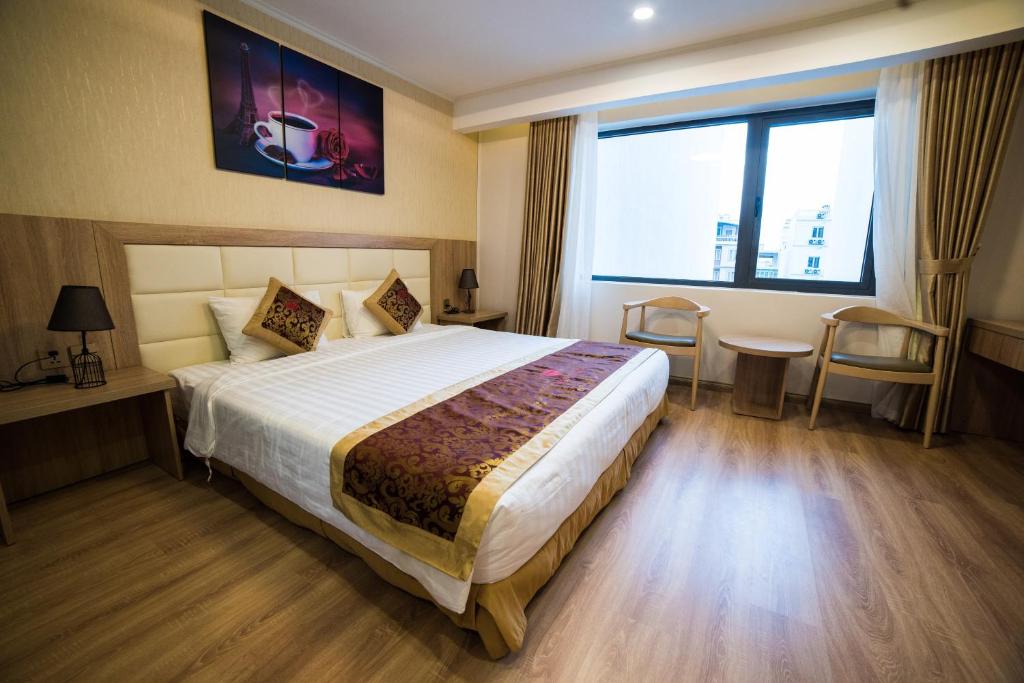 Postelja oz. postelje v sobi nastanitve Ruby Hotel