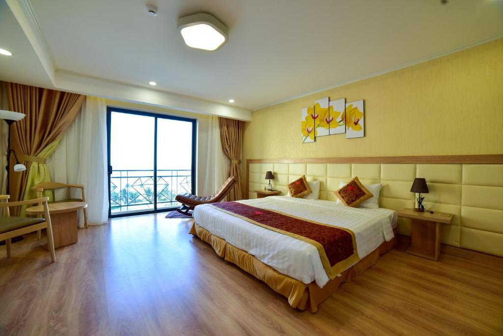 Postelja oz. postelje v sobi nastanitve Ruby Hotel