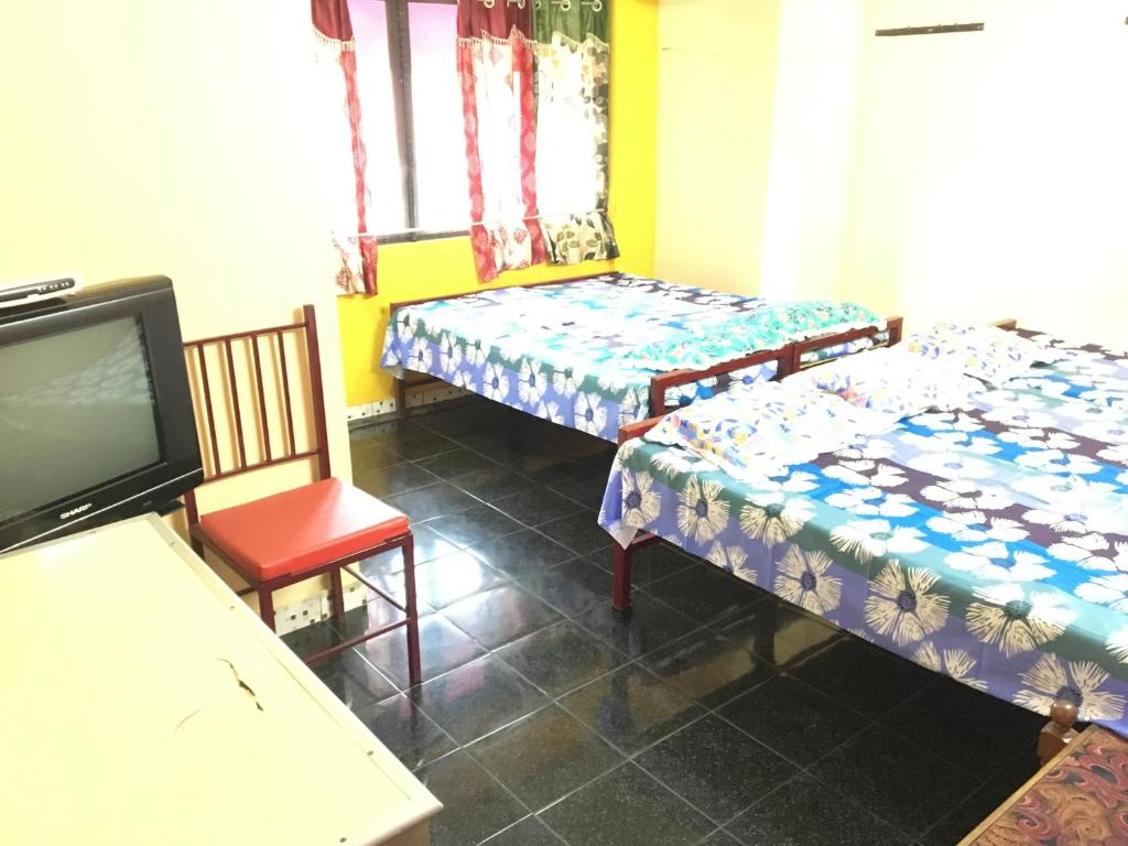 Postel nebo postele na pokoji v ubytování Pleasant Inn