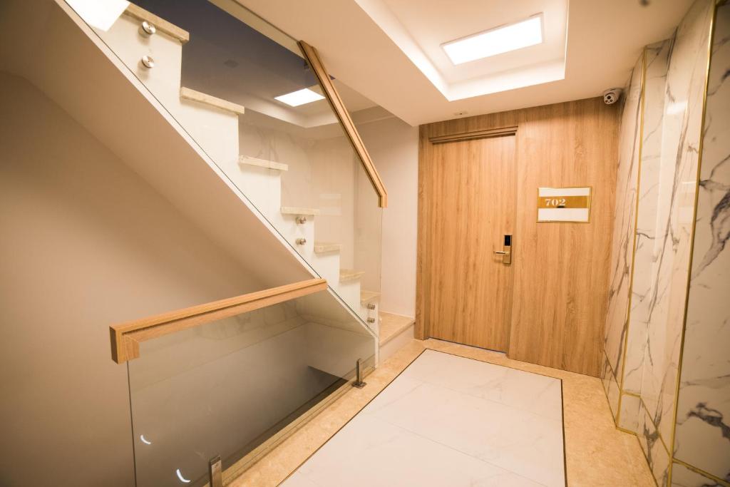 Postelja oz. postelje v sobi nastanitve Ruby Hotel
