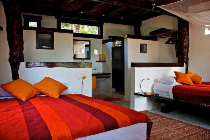 Playa Selva tesisinde bir odada yatak veya yataklar