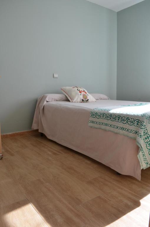 Postel nebo postele na pokoji v ubytování Apartamento Plaza Castañuelas