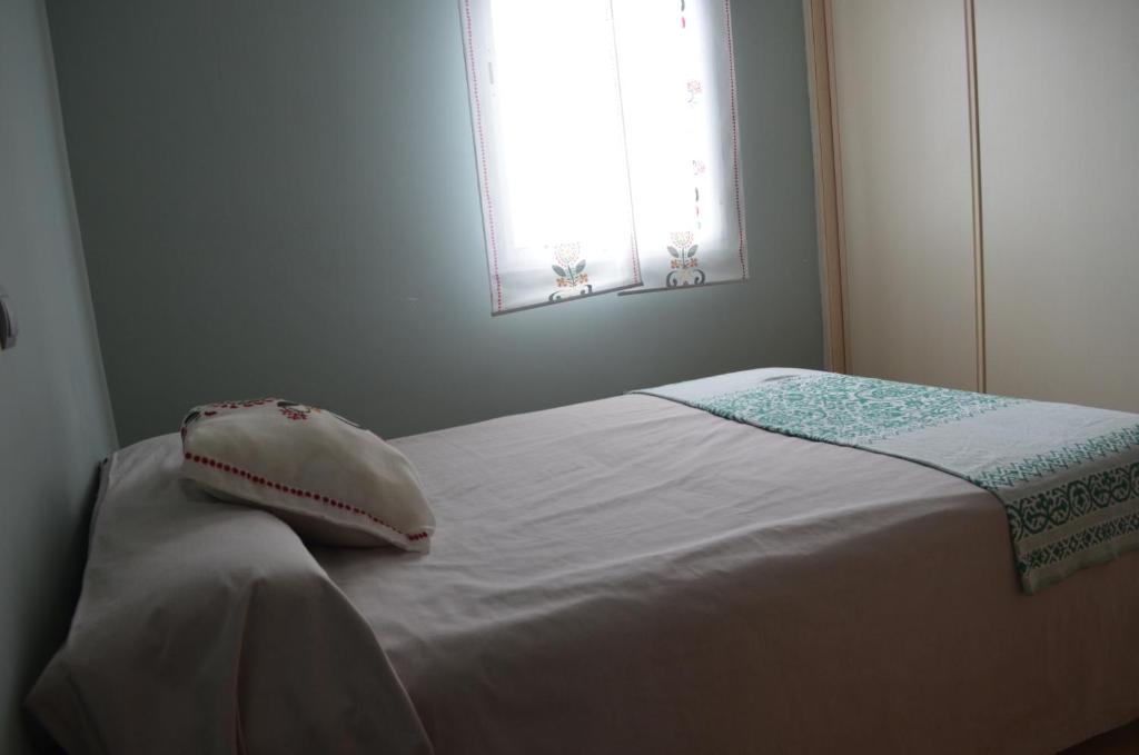 Postel nebo postele na pokoji v ubytování Apartamento Plaza Castañuelas
