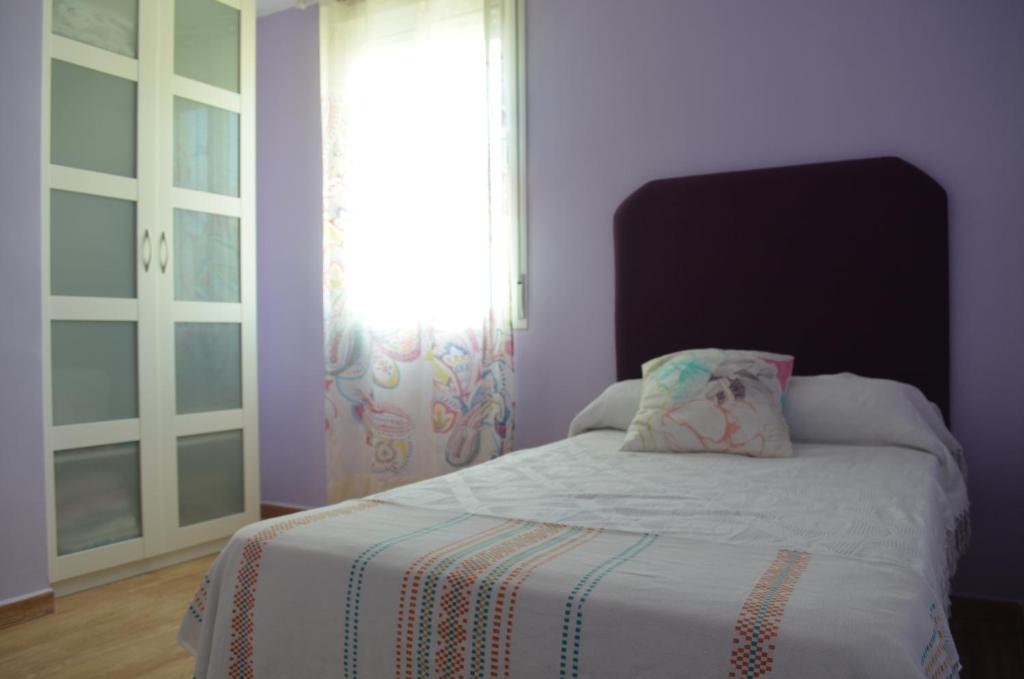 Postel nebo postele na pokoji v ubytování Apartamento Plaza Castañuelas