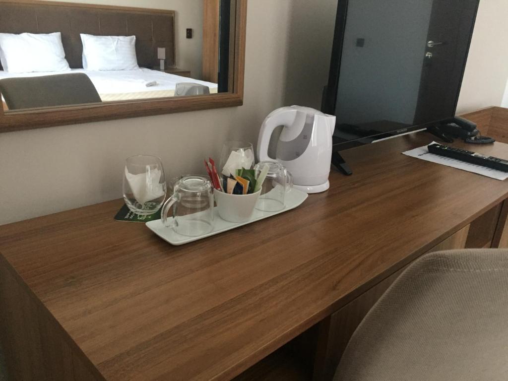 Příslušenství pro přípravu čaje a kávy v ubytování EKA Residence