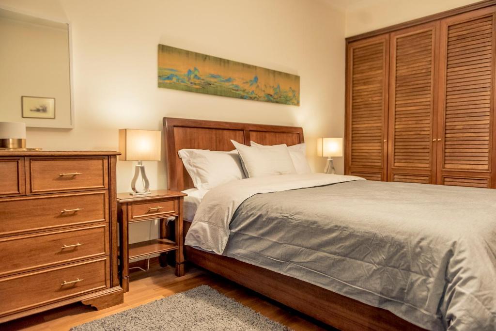 Posteľ alebo postele v izbe v ubytovaní Elegant Supercentral Apartment