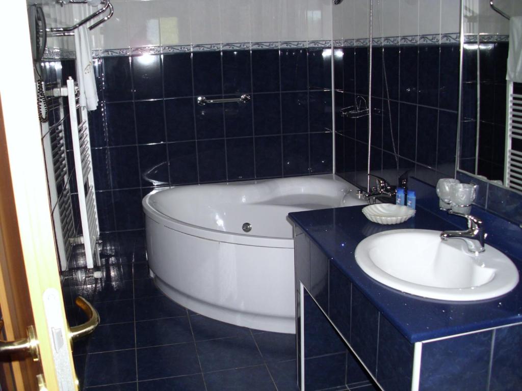 Koupelna v ubytování Hotel Piemonte