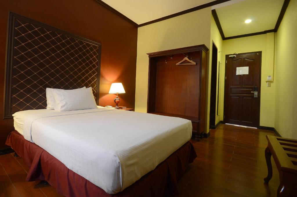 Postel nebo postele na pokoji v ubytování Hotel San Marco