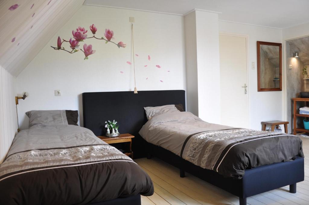 Postel nebo postele na pokoji v ubytování Bed en Breakfast Molenzicht
