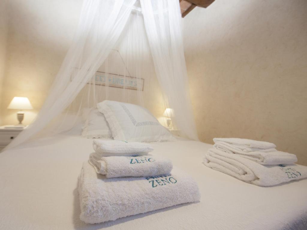 Postel nebo postele na pokoji v ubytování Fonte di Zeno