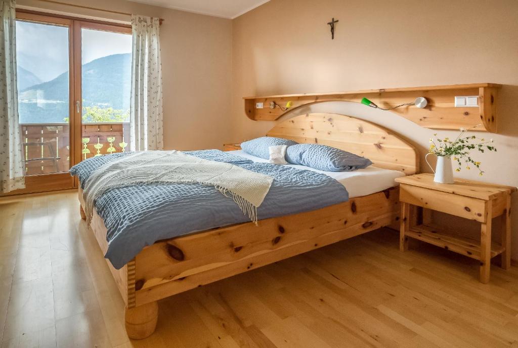 Postel nebo postele na pokoji v ubytování Gasperhof