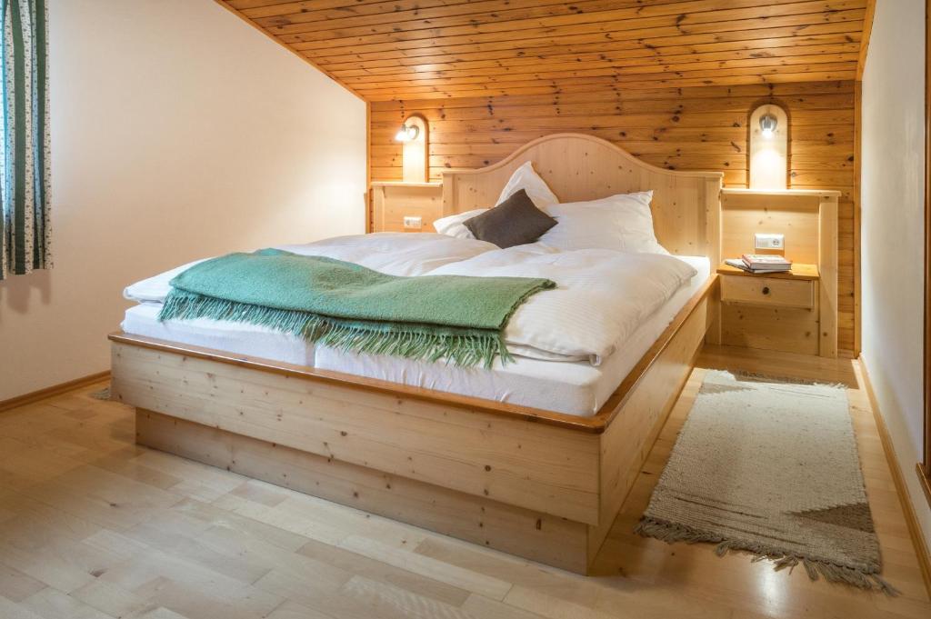 Postel nebo postele na pokoji v ubytování Gasperhof