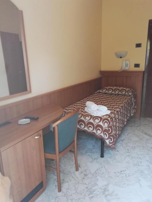 Postel nebo postele na pokoji v ubytování Albergo Di Piero