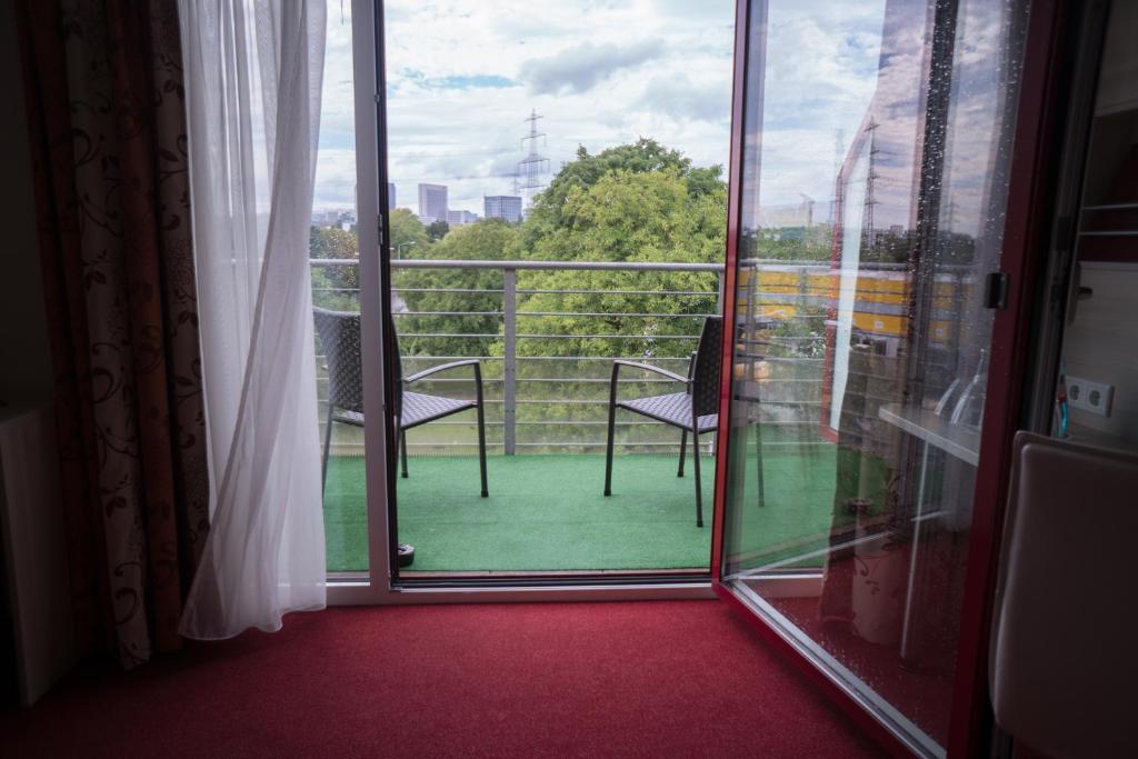 Balkón nebo terasa v ubytování Hotel Rödelheimer Hof - Am Wasserturm