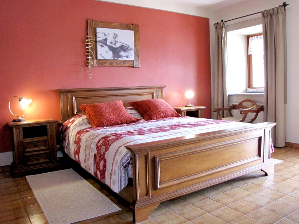 Postel nebo postele na pokoji v ubytování Il cuore dei Foresti