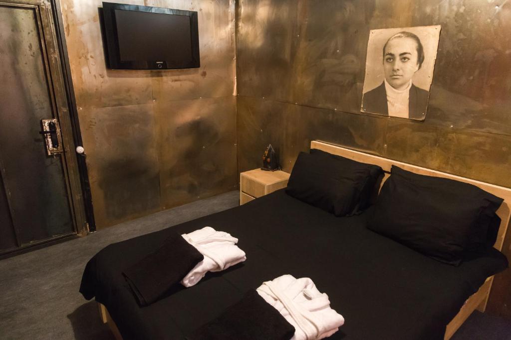 TV a/nebo společenská místnost v ubytování ALCATRAZ JAIL-HOSTEL