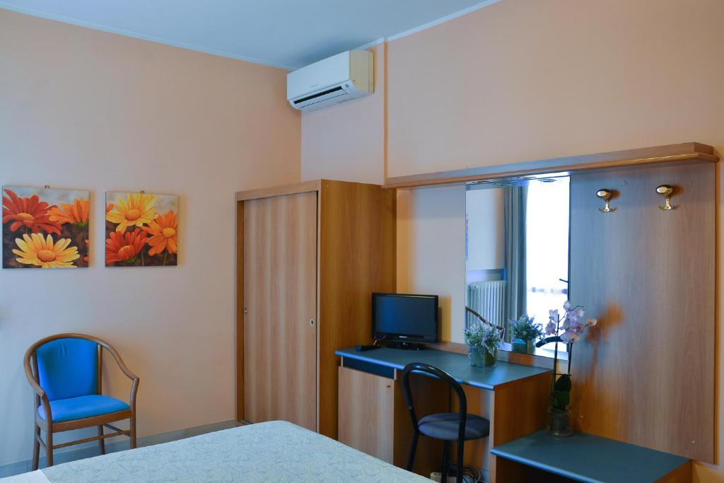 TV a/nebo společenská místnost v ubytování Hotel Astor