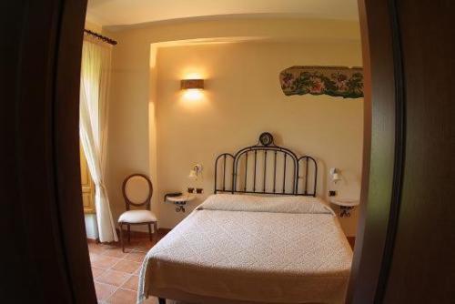 Postel nebo postele na pokoji v ubytování Agriturismo La Casa Di Botro