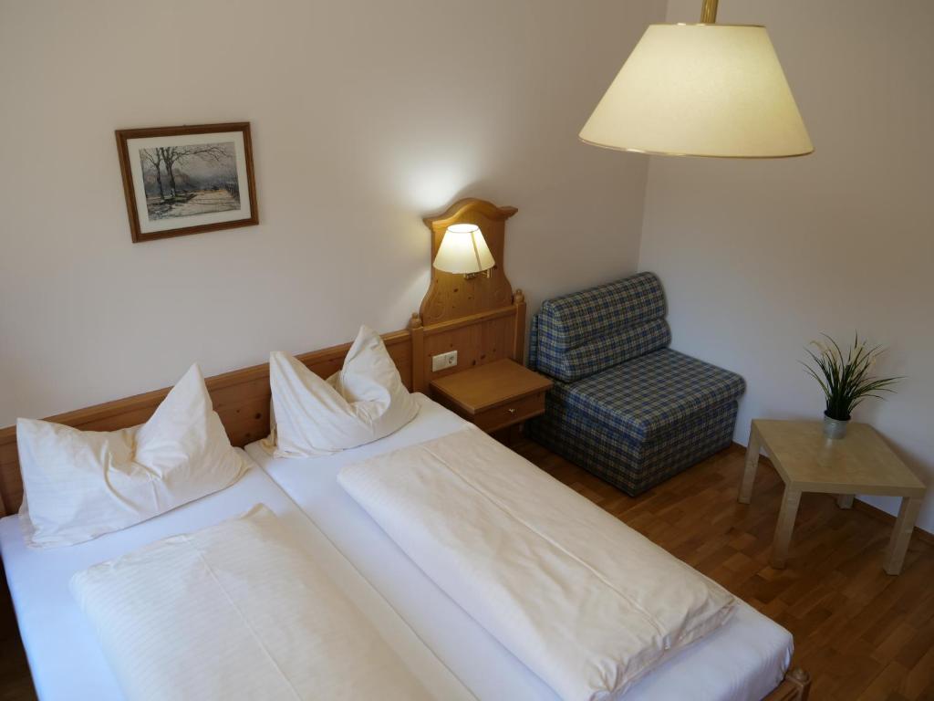 Postel nebo postele na pokoji v ubytování Breitenfelderhof zur Riegersburg