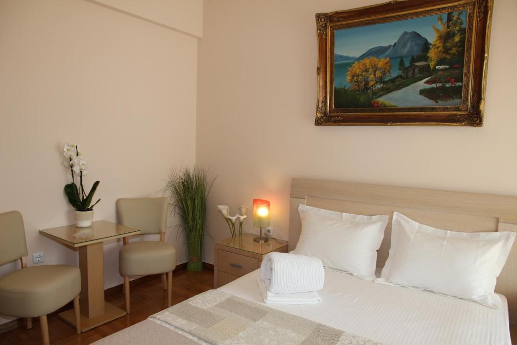 A bed or beds in a room at Olga's Studio