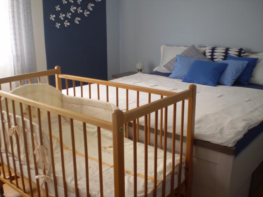 Postel nebo postele na pokoji v ubytování apartman pro 4 osoby
