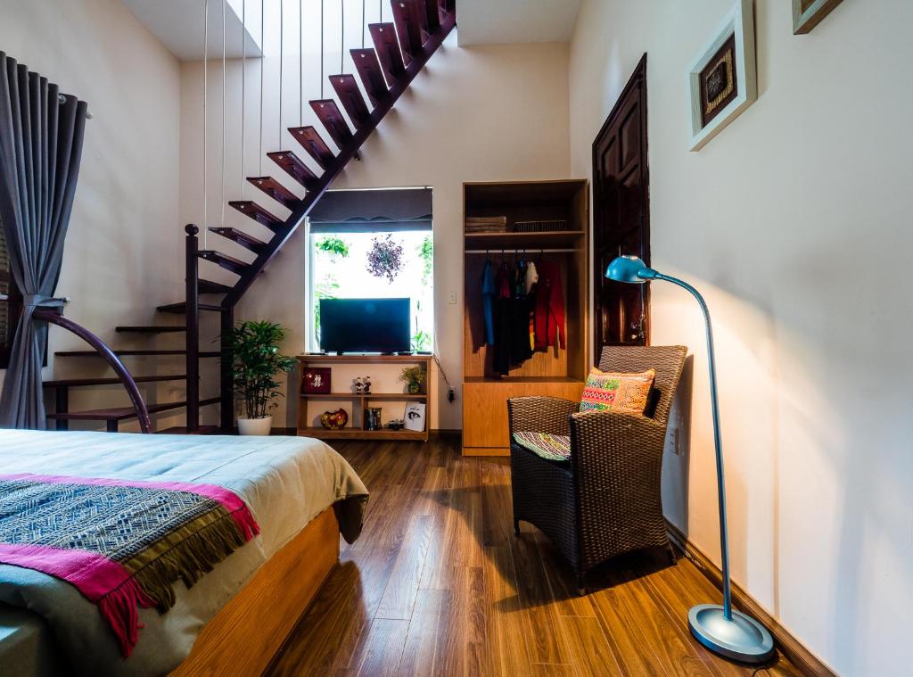 Postel nebo postele na pokoji v ubytování Hanoi Balcony Homestay