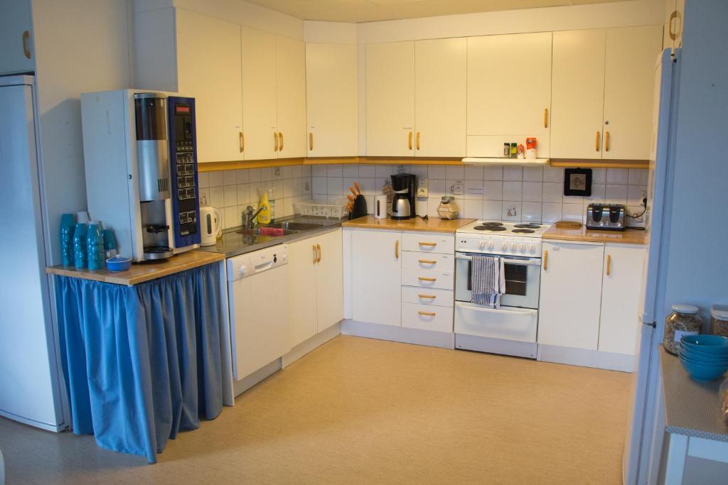 Kuchyň nebo kuchyňský kout v ubytování Docksta Hotell