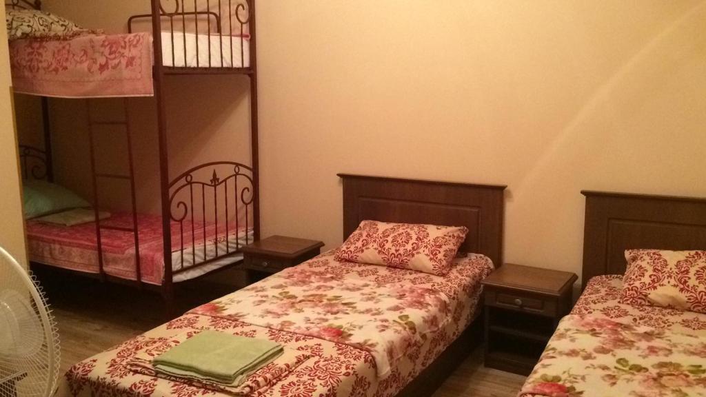 Postel nebo postele na pokoji v ubytování Centre Hostel